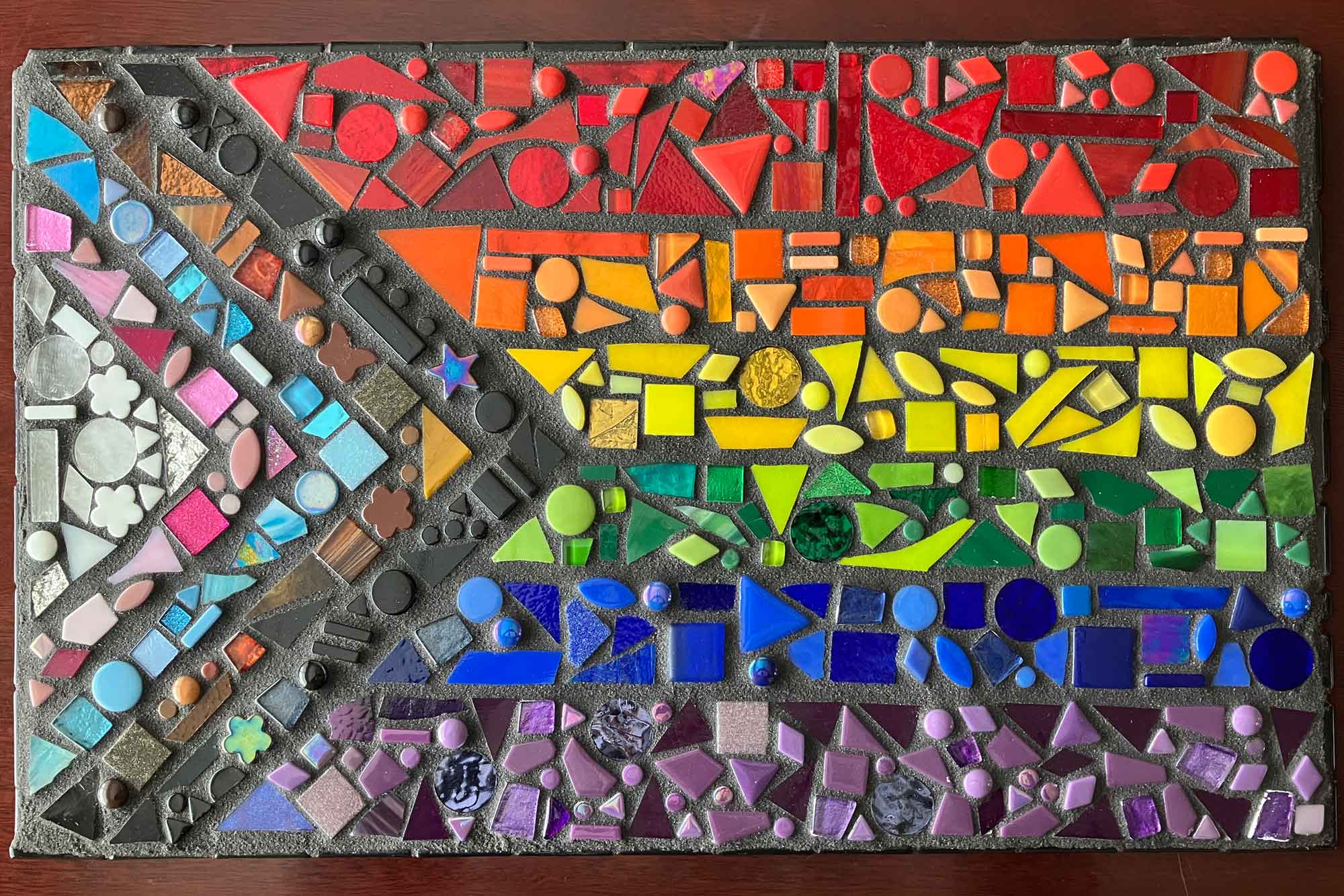 A pride flag mosaic made during Newcastle Days as a community project.
